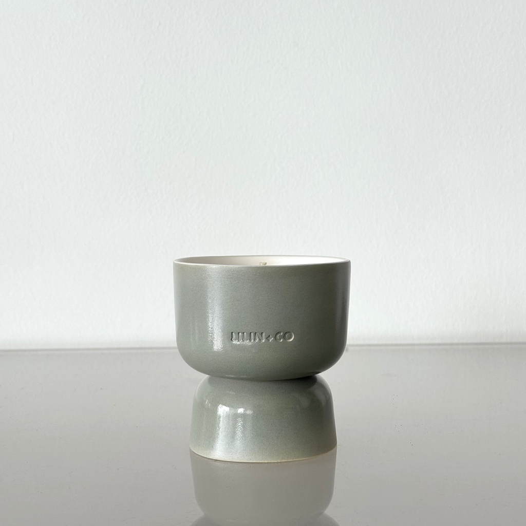 pistachio handmade ceramic candle in green
